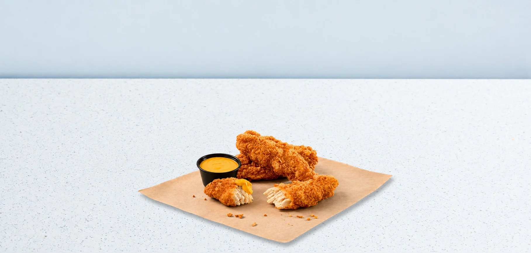 3 Crispy Chicken Tenders with Nacho Cheese Sauce